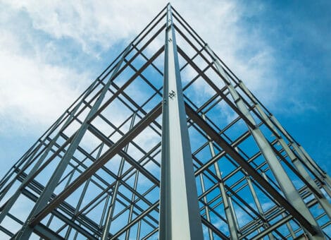 Steel building framework under blue sky
