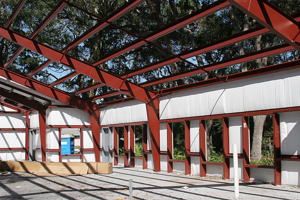 Steel building frame under construction outdoors