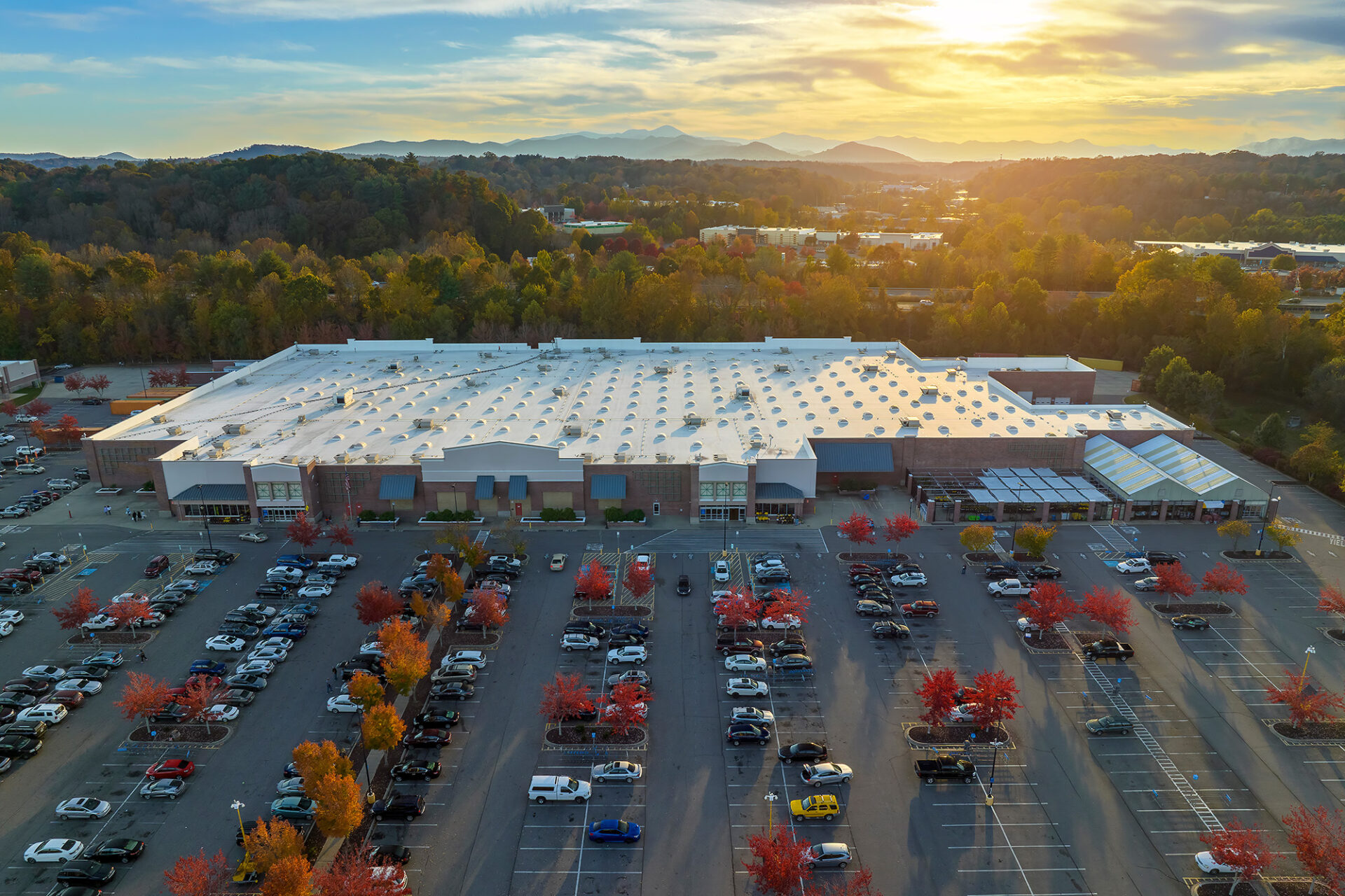 Aerial view of shopping center at sunset
